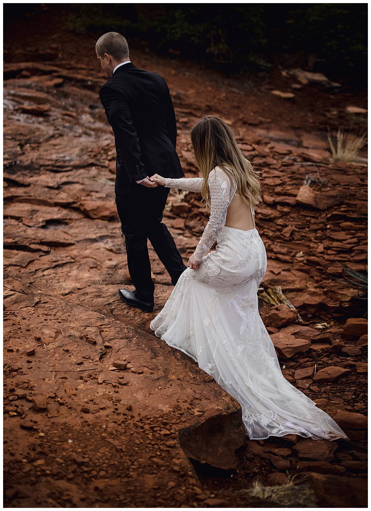 bride and groom in sedona at cathedral rock posing for elopement packages