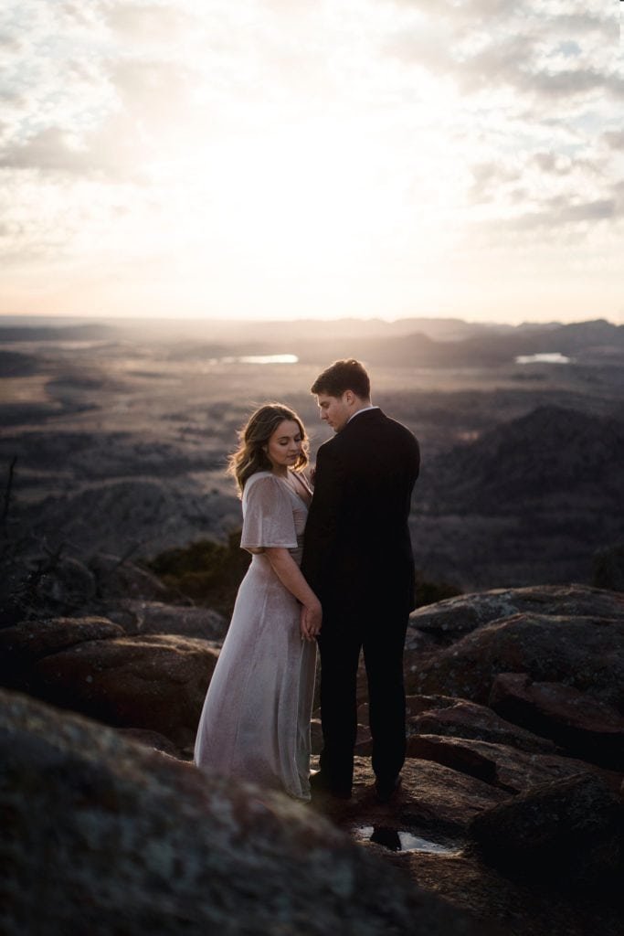 couple at their elopement at Mount Scott in Wichita Mountain Wildlife Refuge.