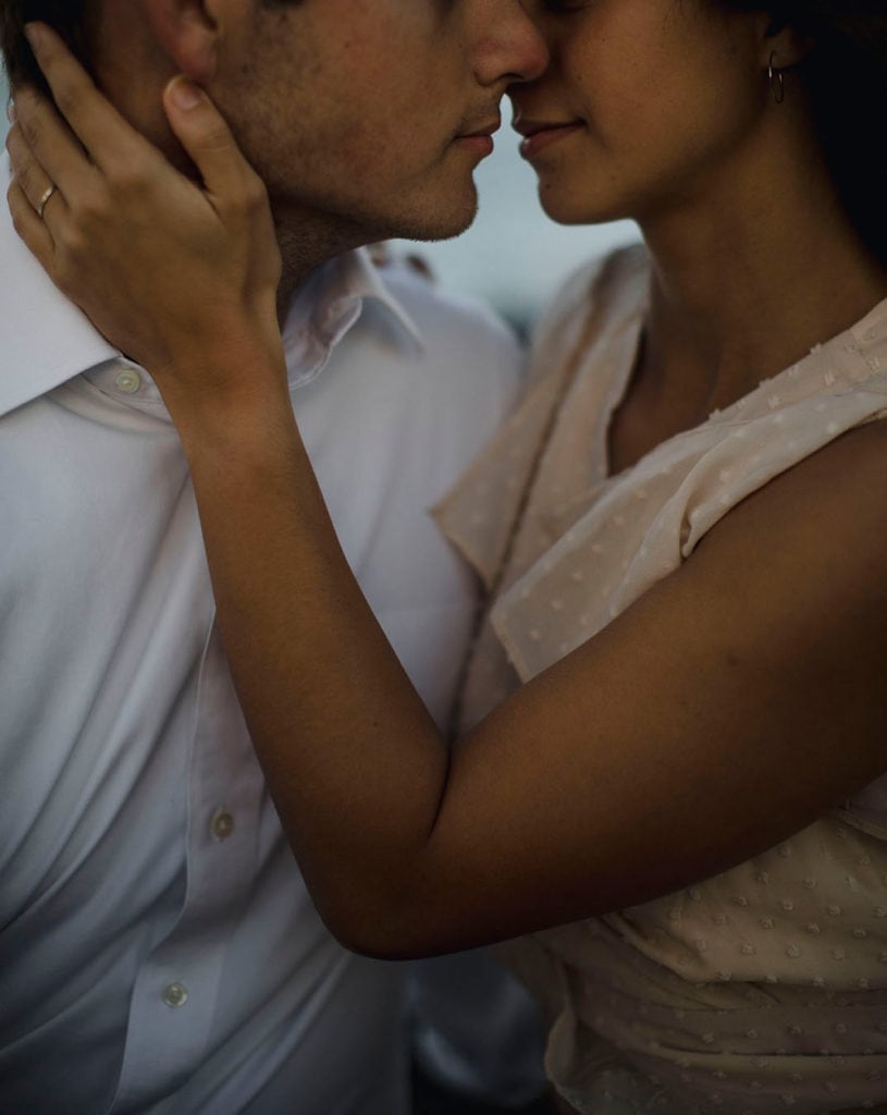 Couple embracing at their elopement in Oahu at turtle Bay resort