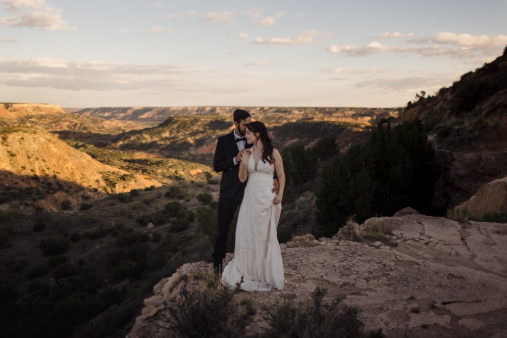 Couple in Palo Duro Canyon Eloping on edge of cliff.