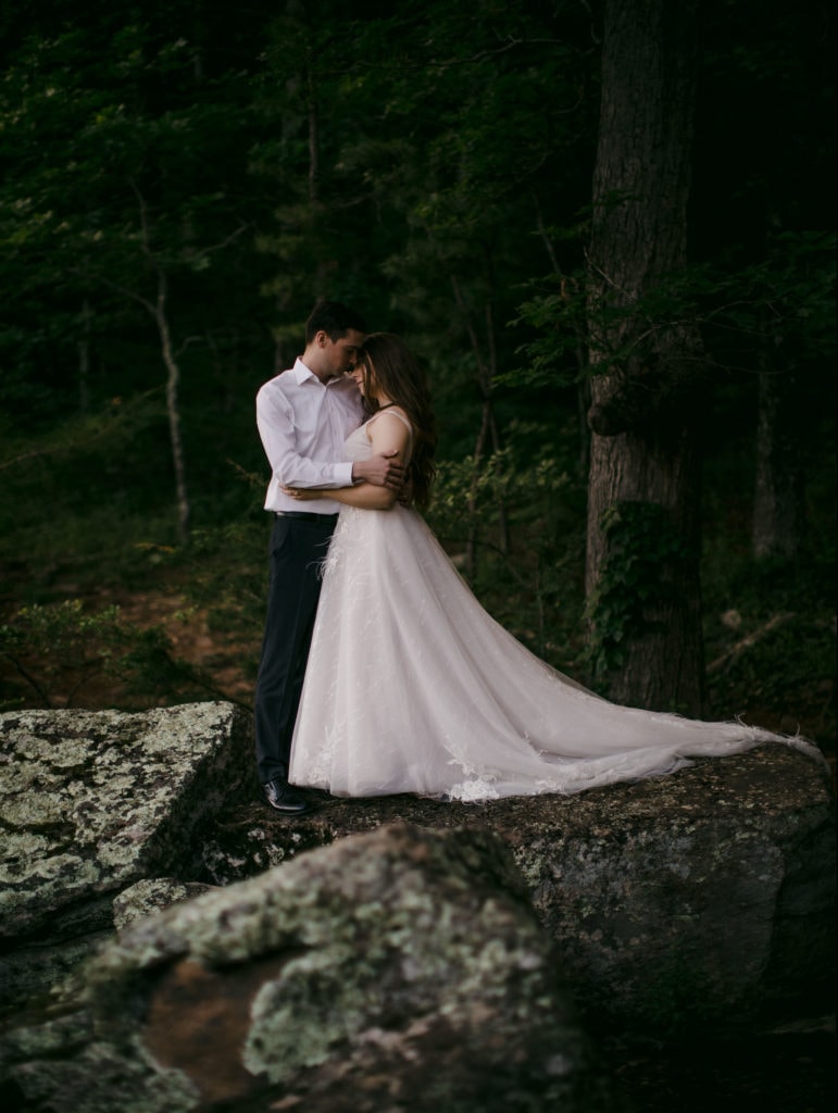 Married couple embracing after their vow renewal in Yosemite National Park.