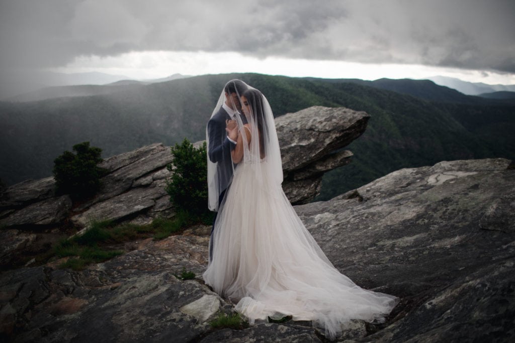 A bride and groom that eloped in Asheville after purchasing an elopement package.