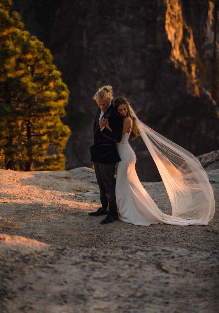 A bride eloping at Taft Point that had to fly with a wedding dress.