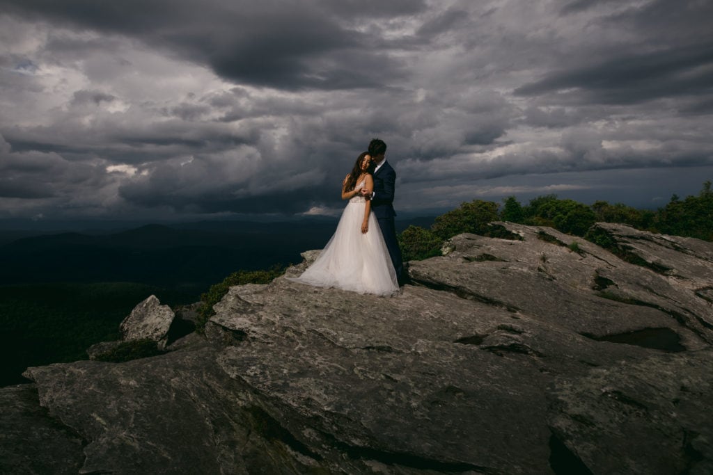 A couple in their adventure elopement photography in Asheville.