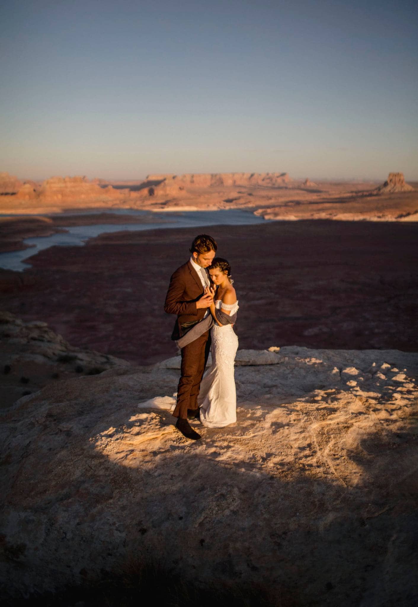 A bride and groom learning how to create an elopement timeline for their wedding day.