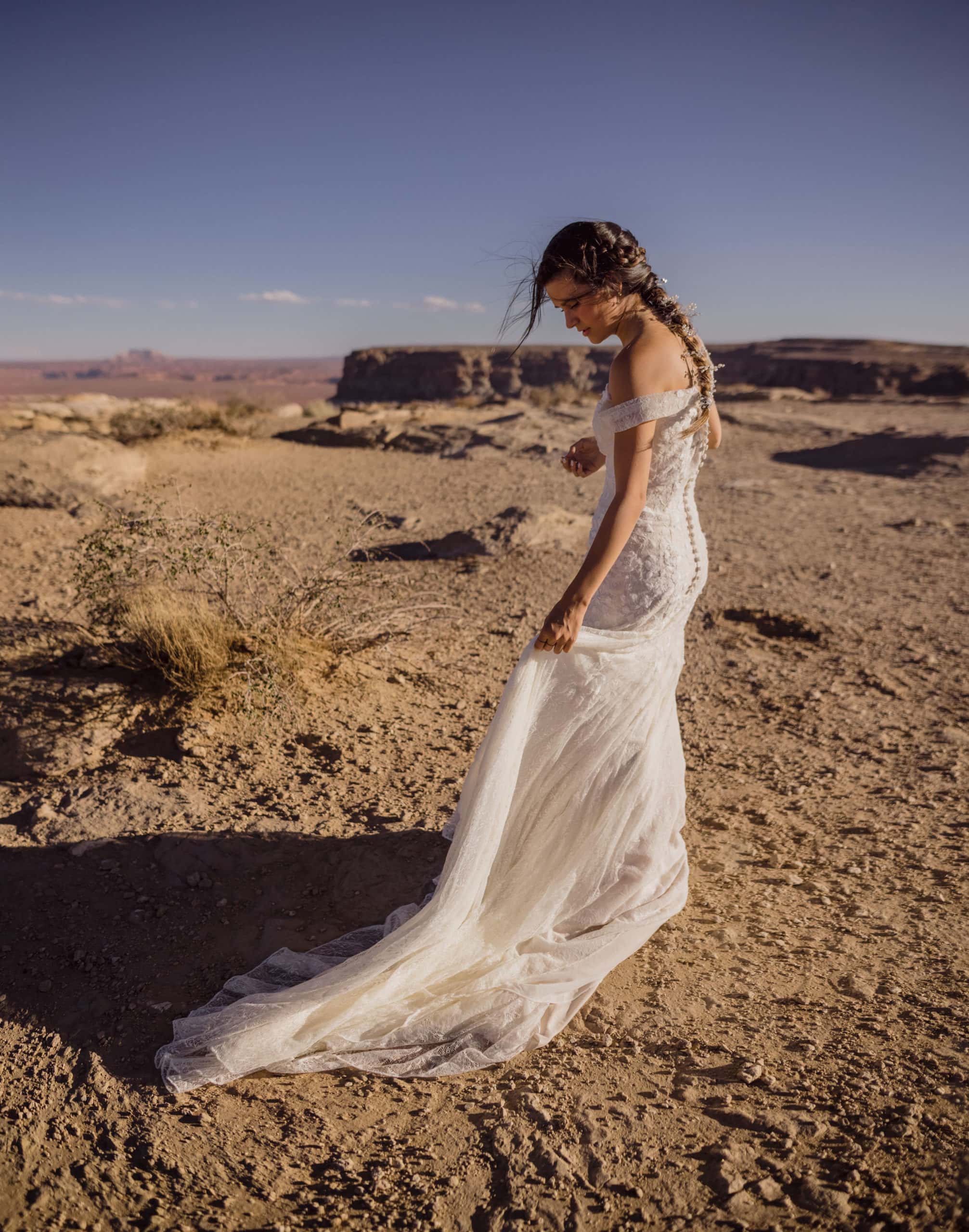 A bride after her wedding in elopement pictures at Lake Powell.