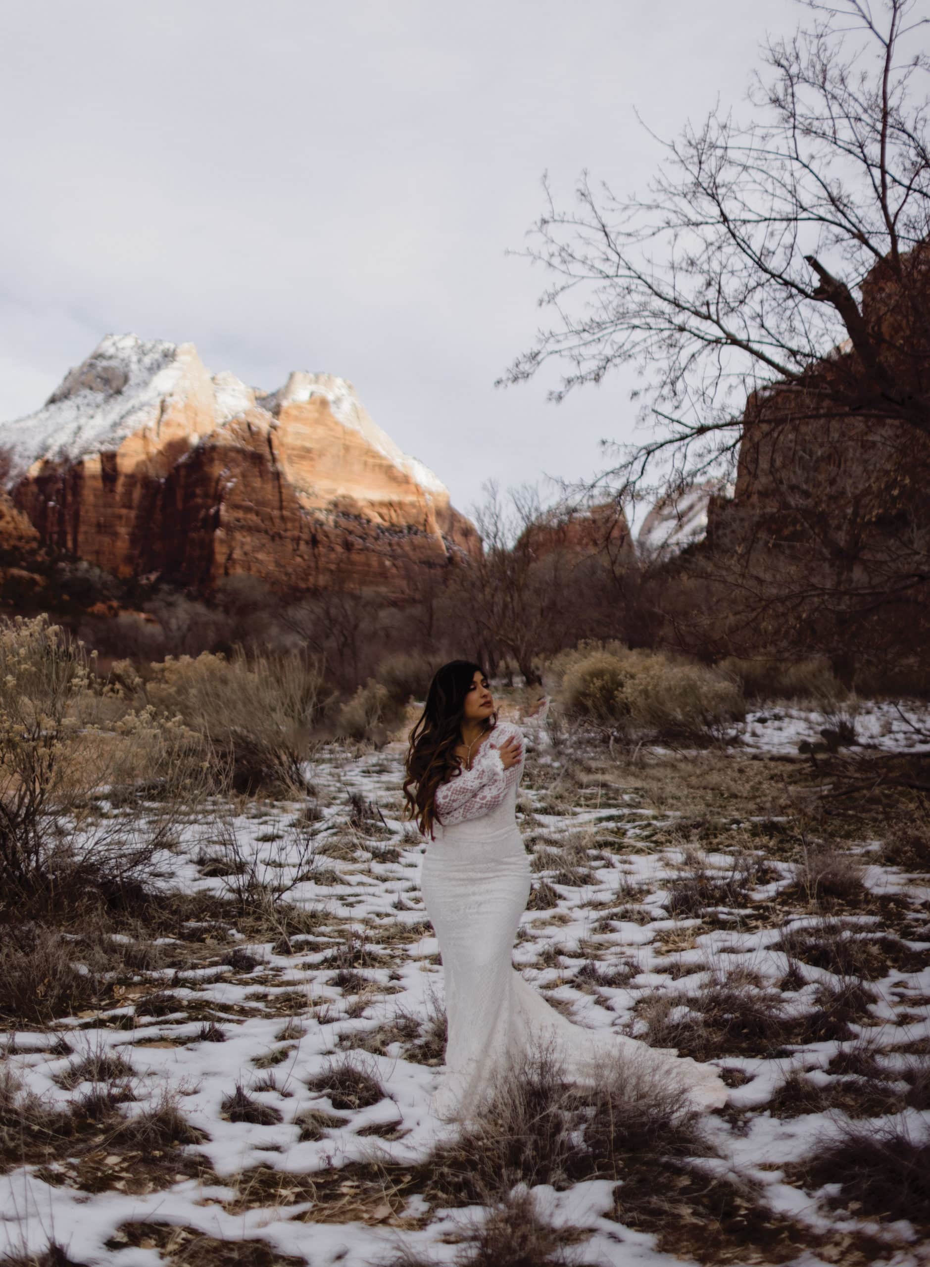 An image of a bride from her zion elopement day in January.