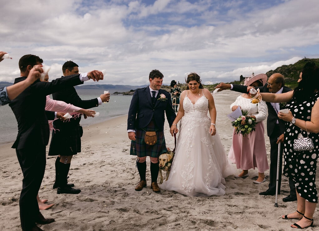 A couple getting married in Scotland with dog.